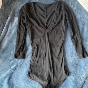 Black fish net body suit